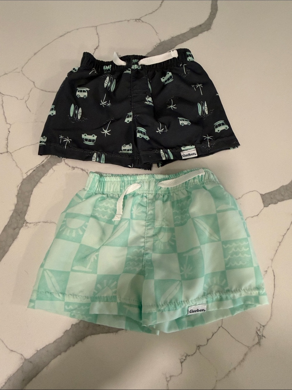 Gerber infant  Black and Mint Patterned Swim Shorts - 2-Pack